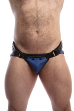 Front view of model wearing a black and blue leather jockstrap with matching coloured codpiece