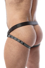 Back view of model wearing a black and grey leather jockstrap