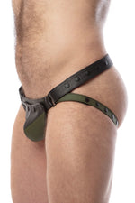 Side view of model wearing a black and army green leather jockstrap with shadow detail on codpiece
