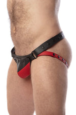 Side view of model wearing a black and red leather jockstrap with shadow detail on codpiece