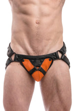 Black leather jockstrap with orange and black leather harness codpiece