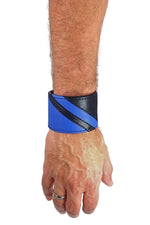 Model wearing a black leather wristband with blue leather chevron detailing. Right Wrist.
