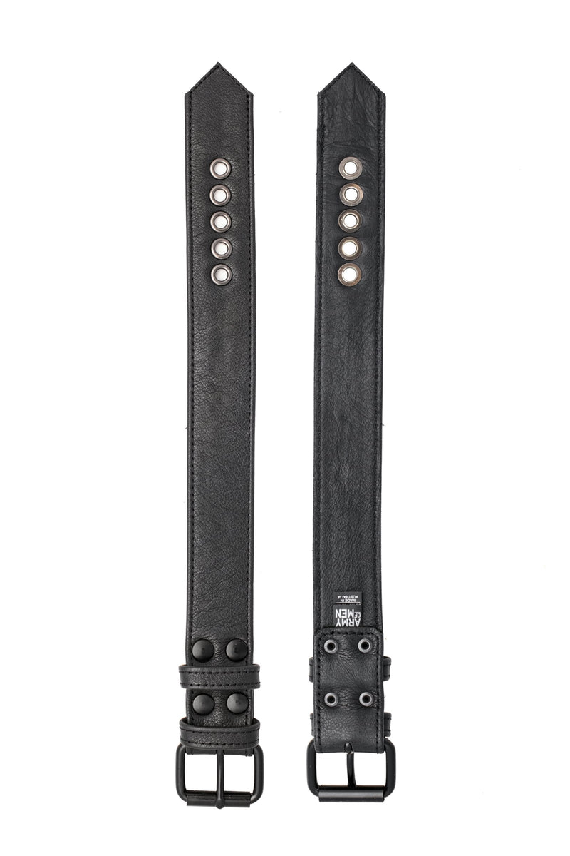 Two 1.5" wide black leather buckled armbands are laid out to reveal both the front details and back leather lining.