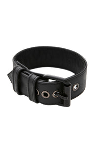 A black leather armband belt with matte black components, coiled into a loop.