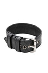 A 1.5" wide black leather buckled armband with stainless steel hardware, in a coil.