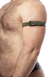 An army green leather armband belt with matte black parts, fitted on a thick model in a side pose.