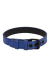 A 1" wide blue leather buckled armband with matte black hardware, curled into a ring.