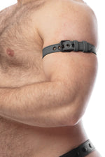 Model wearing a 1" wide grey leather armband belt with matt black hardware