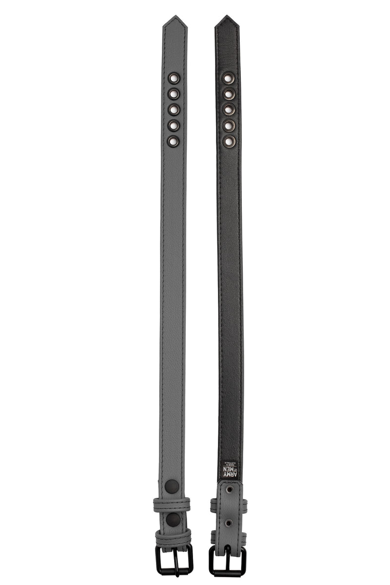 Displayed flat, two 1" wide ARMY OF MEN grey leather armbands with matte black hardware showing both front and back.