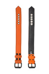 Two 1.5" wide orange leather armband are laid out to reveal both the front details and back leather lining.