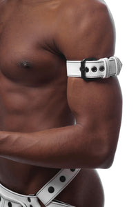 Tight-angled shot of a fit model in a white leather armband featuring matte black details.