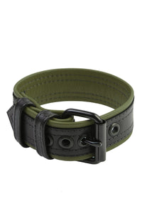 Coiled display of a COMBAT ARMBELT - Army Green with matte black hardware.