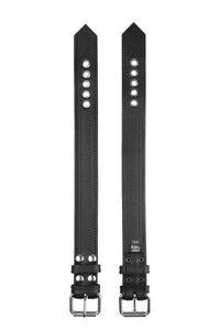 Side-by-side display showing both sides of a 1.5" wide black leather buckled armband with stainless steel hardware.