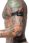 Close-side perspective of a model wearing a black and grey leather armband belt with matte black hardware.