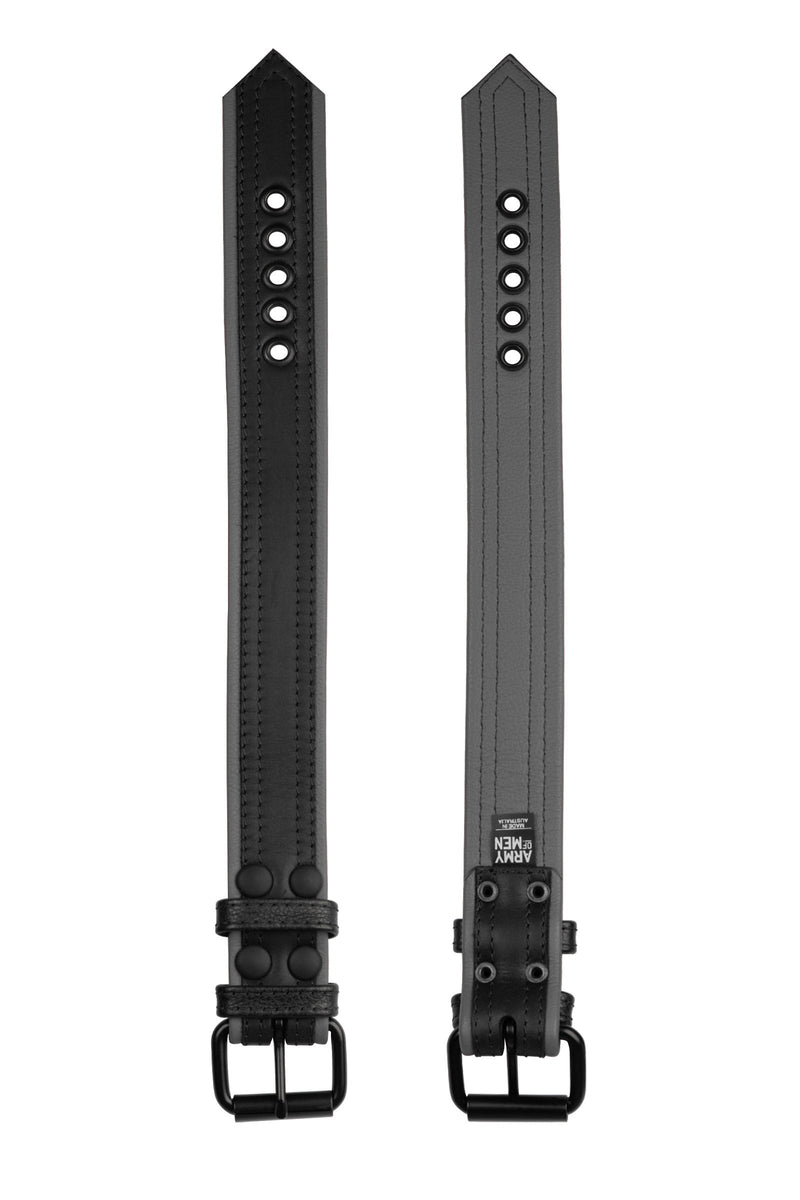 Dual view of a black and grey leather armband with matte black buckle showing front and lining.