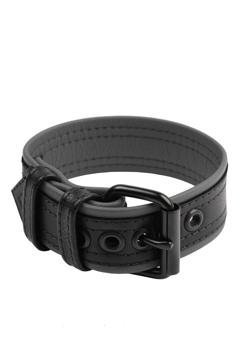 A 1.5" wide black and grey leather armband belt with matte black hardware, curled into a ring.