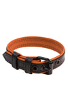 A curled black and orange leather buckled armband with matte black components.