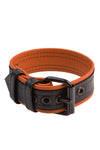 Coiled display of a COMBAT ARMBELT - Orange with matte black hardware.