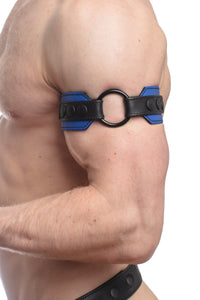 Zoomed side shot showing a model styled in a 2" wide blue and black leather armband with matte black hardware.