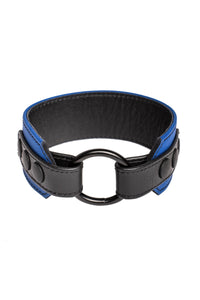 A 2" wide O-RING ARMBAND - Blue with matte black hardware standing in a ring shape.