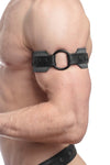 Zoomed shot of a male model from the side, dressed in a 2" wide O-RING ARMBAND - Grey with a matte black O-ring.
