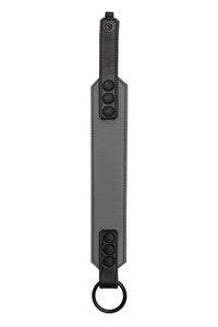 Displayed flat, the 2" wide grey and black leather armband features matte black hardware.