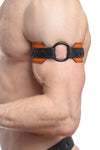 Side close-up of a chiselled model showing a 2" wide orange and black leather armband with matte black hardware.