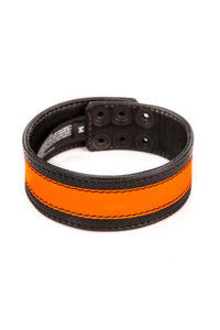 Coiled FLURO STRIPE ARMBAND - Fluro Orange with a matte black snaps forming a circular display.
