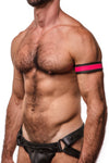 Side-facing profile of a model in a black and fluro pink leather armband featuring matte black snaps.