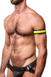 Profile view of a model styled in a black and fluro yellow leather armband with matte black hardware.