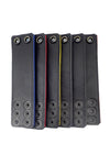 Laid out neatly, six coloured ball stretchers revealing their black leather lining.