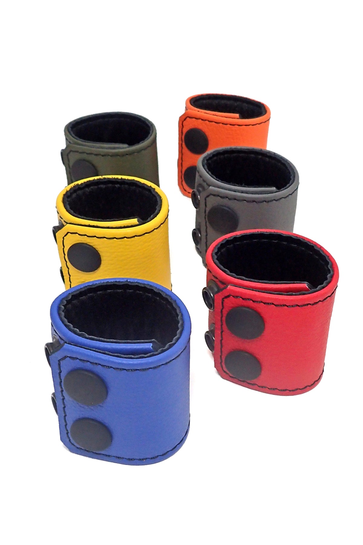 Six coiled coloured ball stretchers with a matte black snaps.
