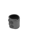 Coiled display of a 2" wide grey leather ball stretcher detailed with matte black hardware.