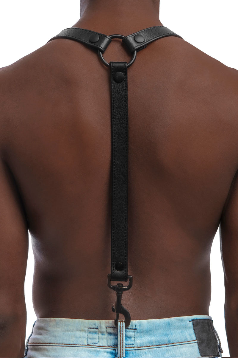 Rear view of fit model in a 1" wide ARMY OF MEN UNIVERSAL BRACES - Black with black O-ring, rivets, snaps, and snap clips.