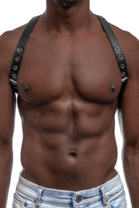 1" wide black leather braces with stainless steel hardware on a Black model, facing forward. Worn as a shoulder harness.
