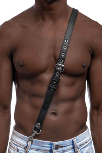 Male model in a 1" wide leather UNIVERSAL BRACES with stainless steel hardware, front facing view. Worn as a Sam Browne belt.