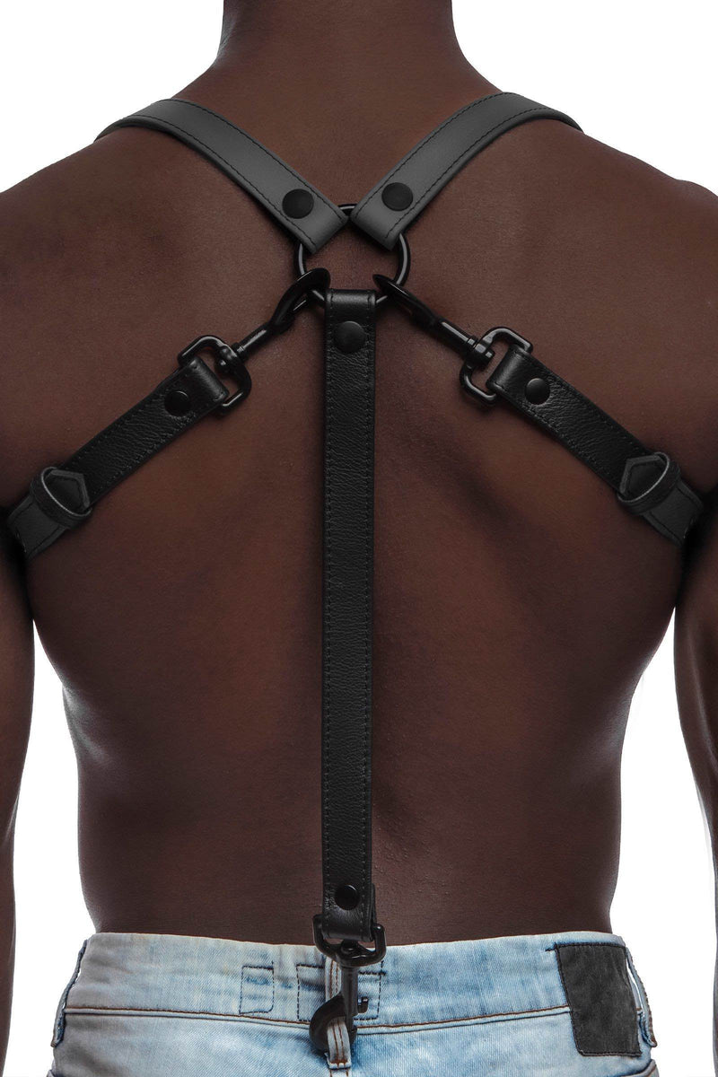 A defined model in a 1" wide ARMY OF MEN UNIVERSAL BRACES - Grey with matte black hardware attached to jeans, back view.
