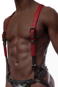 A 1" wide ARMY OF MEN red and black leather full body harness with black O-ring, rivets, and snap clips, worn by a fit model.