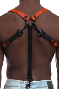 Back shot of Black model in a 1" wide ARMY OF MEN orange leather braces with black O-ring, rivets, snaps, and snap clips.