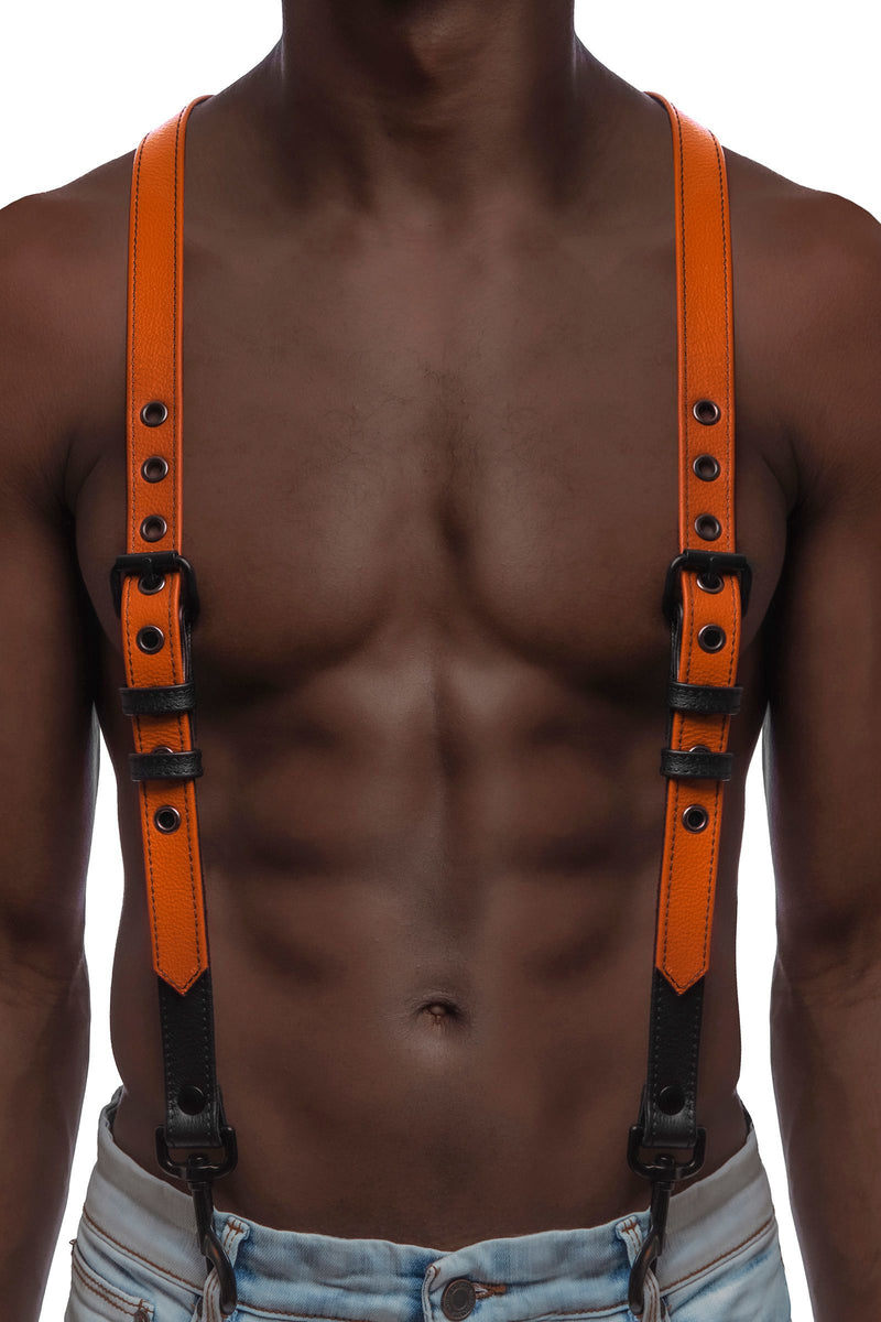 A Black model facing forward in a 1" wide ARMY OF MEN orange leather braces with matte black hardware, attached to jeans.