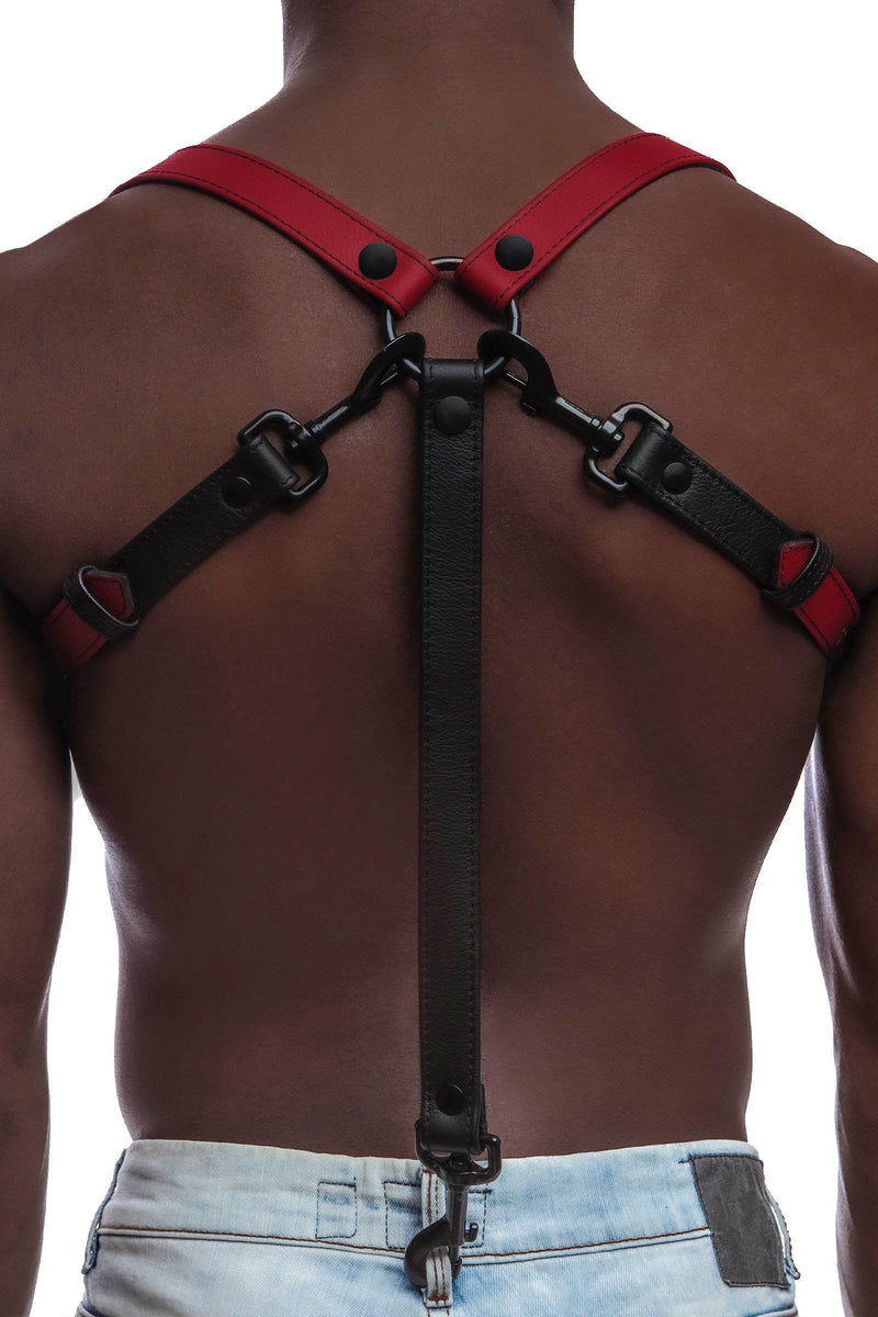 A defined model wearing a 1" wide ARMY OF MEN red leather braces with matte black hardware, back view.