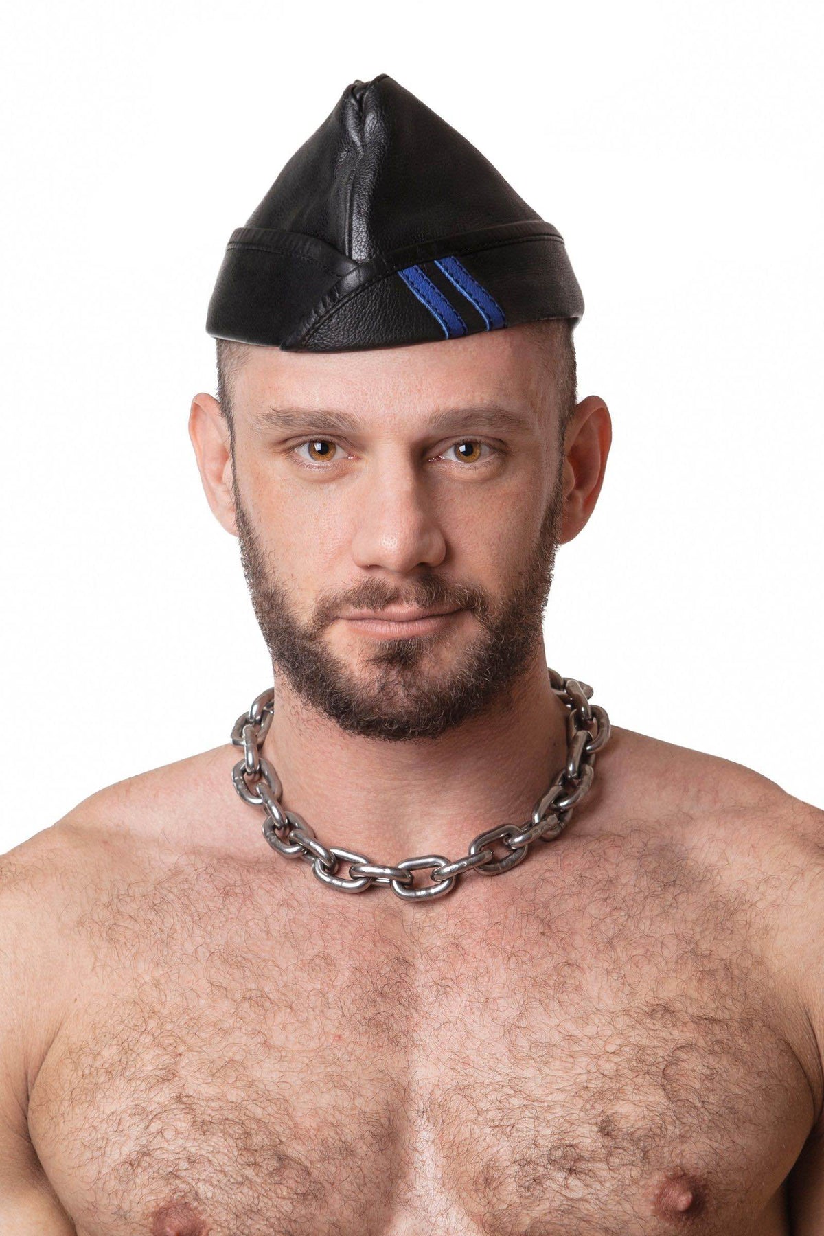 An Australian made ARMY OF MEN black and blue leather garrison cap worn by a muscular model.