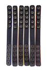 Six 3/4" wide coloured cockrings laid flat, displaying the black lining.