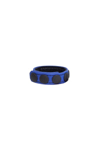 A blue leather cockring finished with matte black components, formed into a loop.