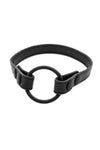 Black leather cockring strap in a ring