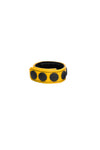 A yellow leather cockring with matte black snaps, looped into a ring.