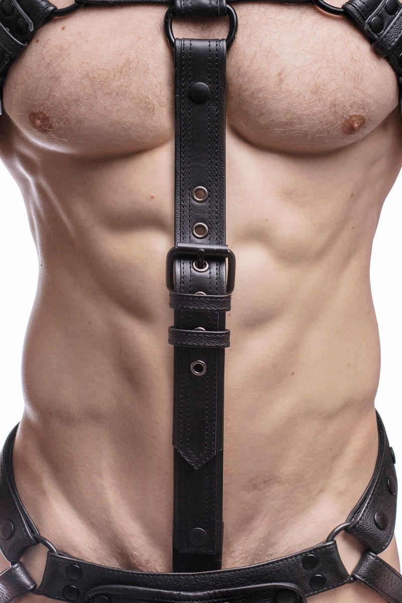 Tight shot of male model wearing a 1.5" wide ARMY OF MEN COMBAT COCKSTRAP - Black with a matte black buckle.