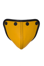 Yellow leather codpiece with black leather trim and hardware