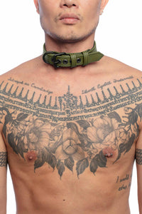 Front on shot of male model wearing a 1" wide ARMY OF MEN army green leather collar with matte black hardware.