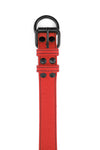 Flat lay view of a 1.5" wide ARMY OF MEN red leather collar with matte black rivets, buckle, and D-ring.